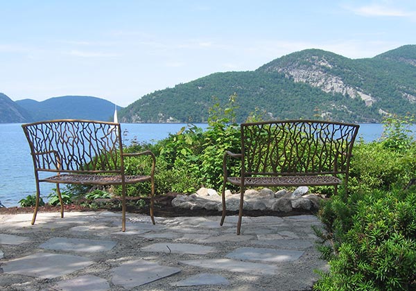 Decorative benches overlooking Adirondack Mountains and Lake George